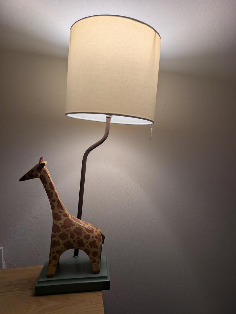 Lamp which has a giraffe as it's base