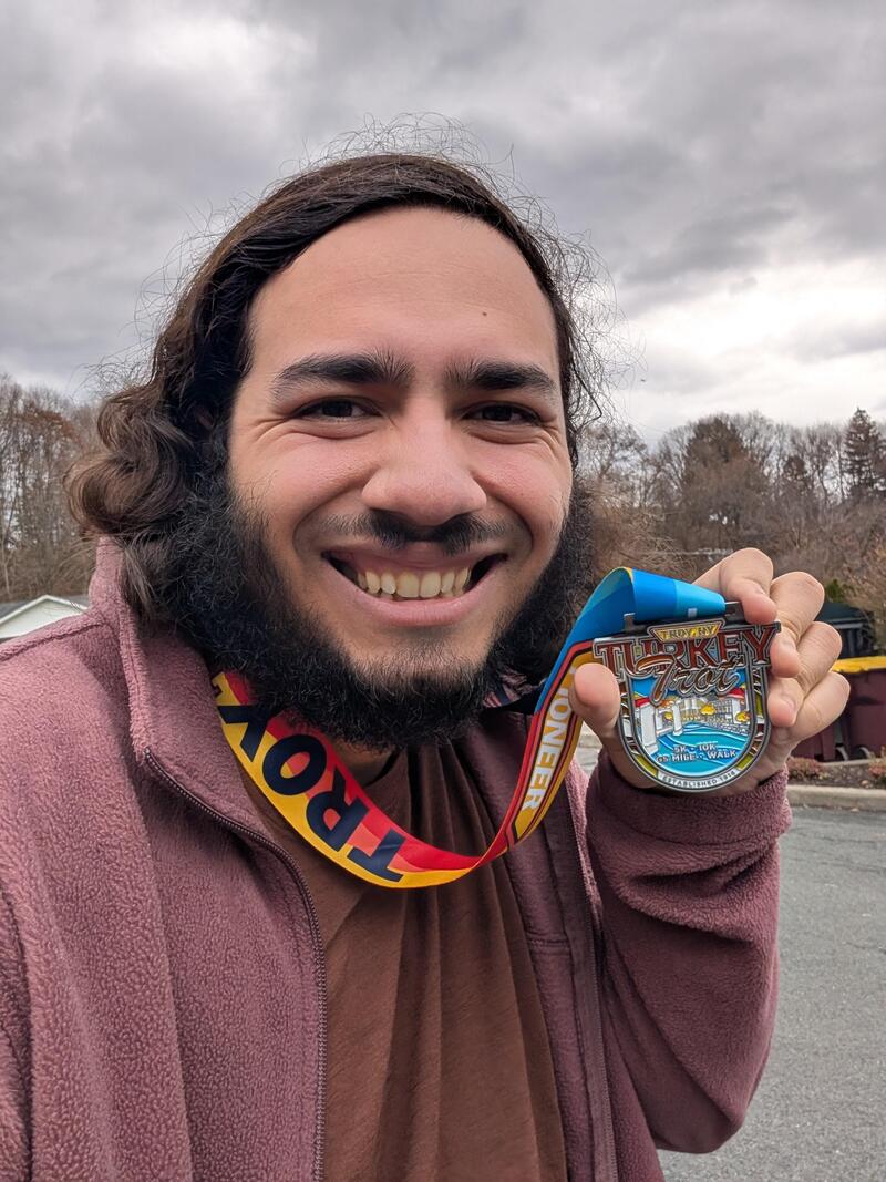 Selfie of me with the participation medal